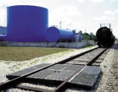 Ultra TrackPans® for Railcar Spill Containment With Grates